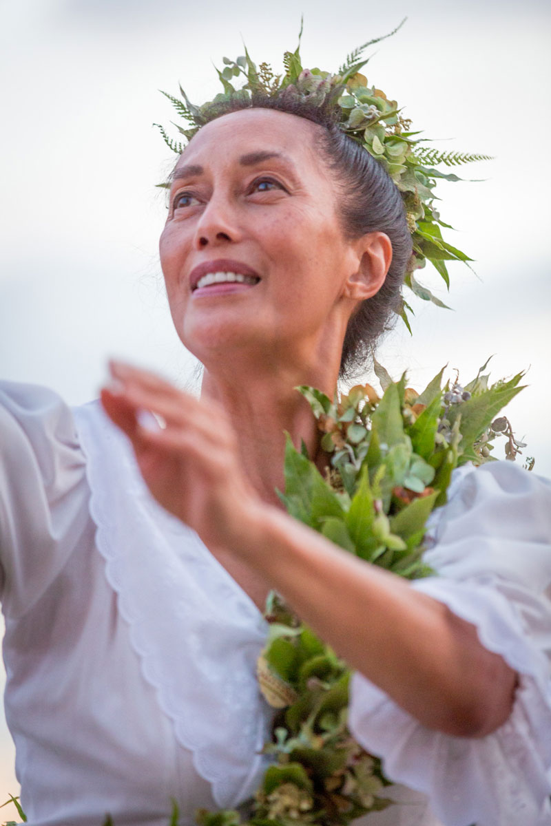 Hula dancer with native plant adornments